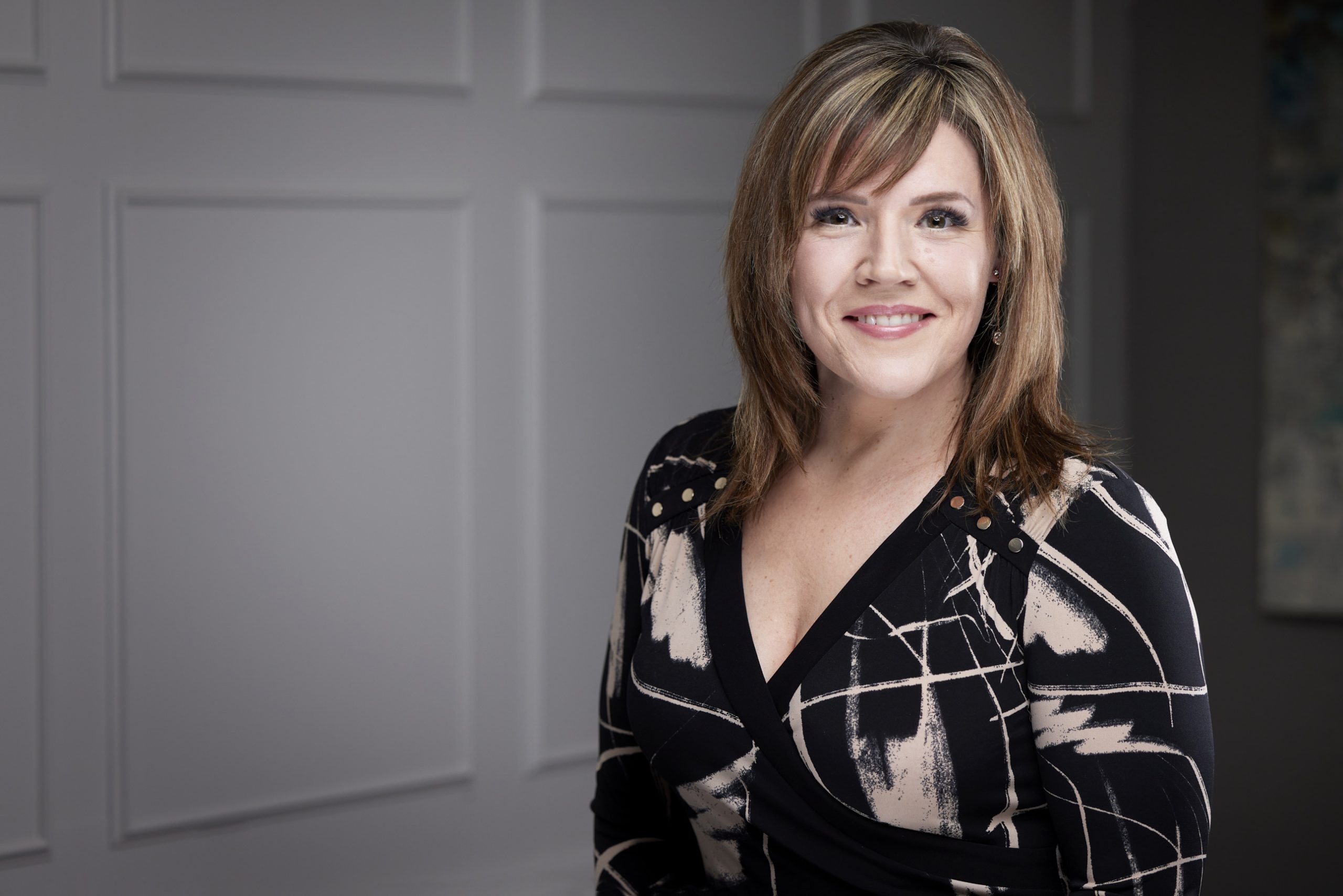 An image of Karen Britton in the St. Catharines office of DDL & Co.
