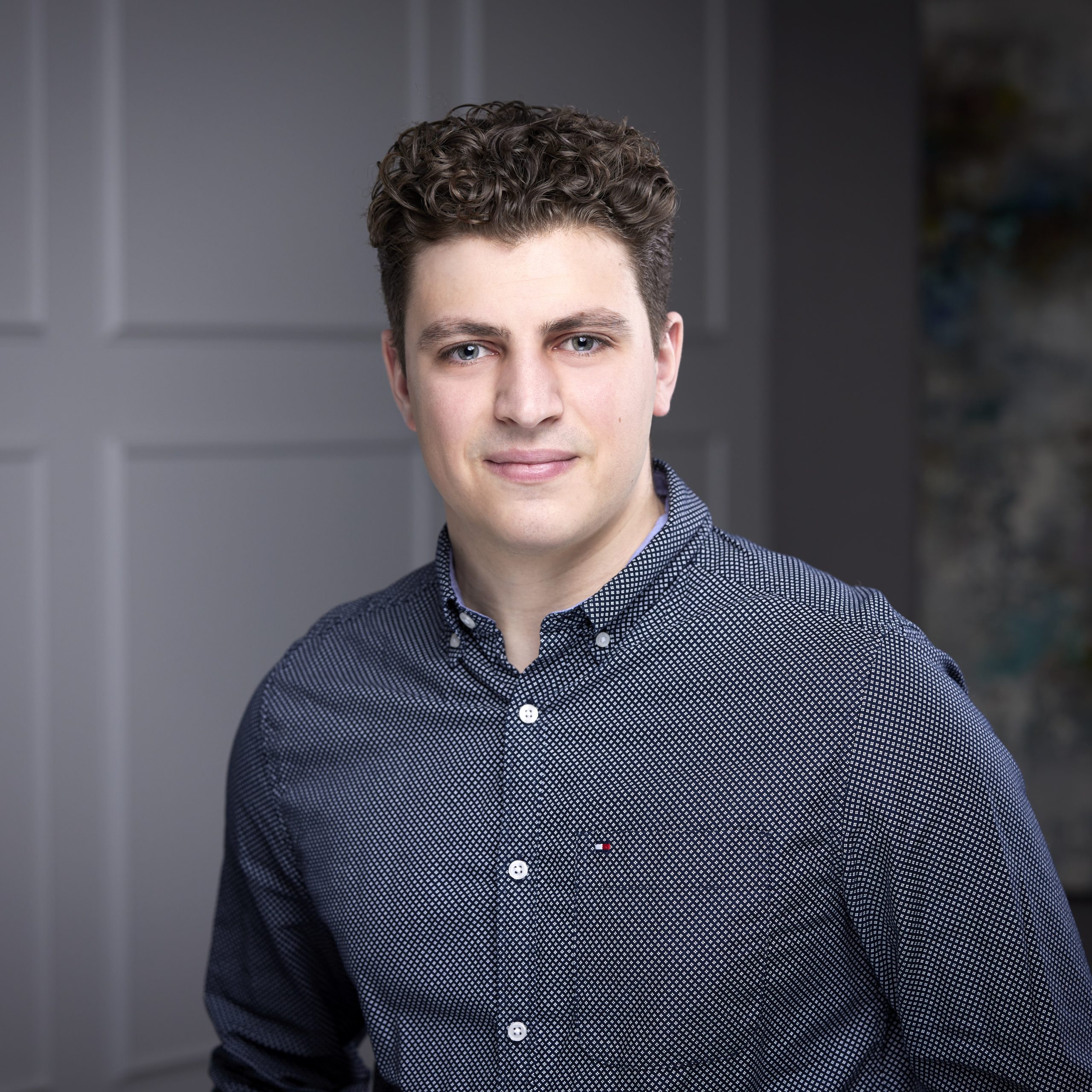 An image of Dylan Paolone in the St. Catharines office of DDL & Co.