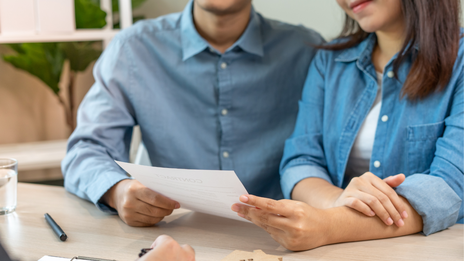 An image of two business owners reviewing their redundant assets prior to selling their business in St. Catharines.