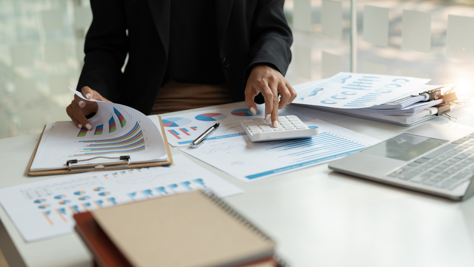 An image of a local Niagara bookkeeper reviewing a small businesses records.