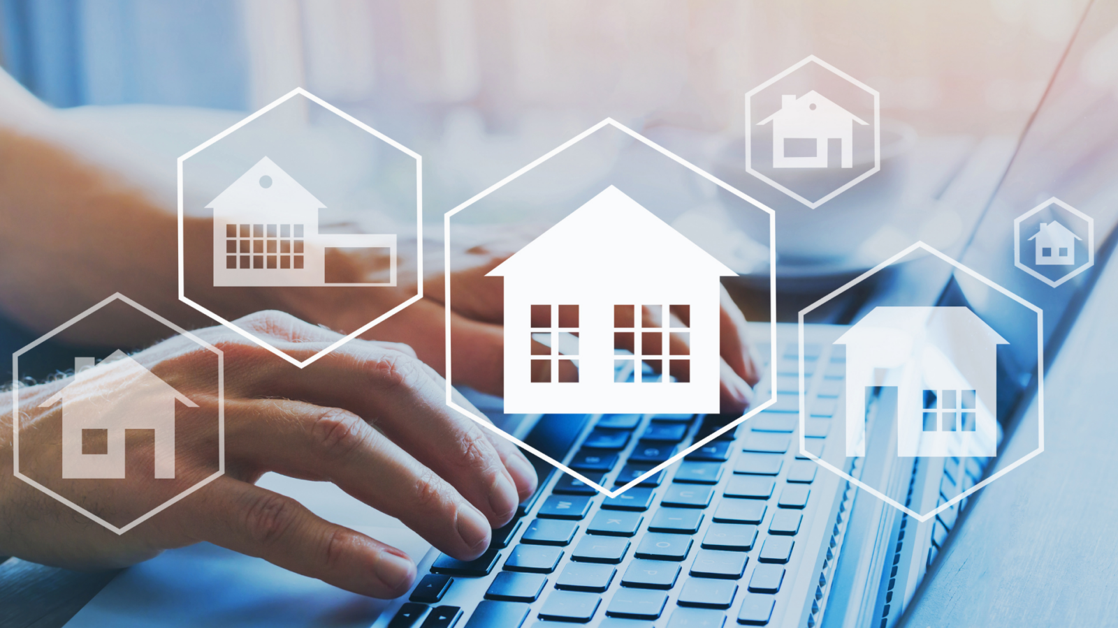 An image of a homeowner using their computer to help them buy a new home